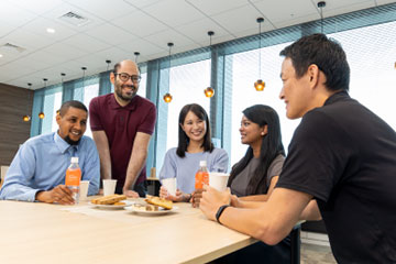 Employees taste-testing emergency food supplies